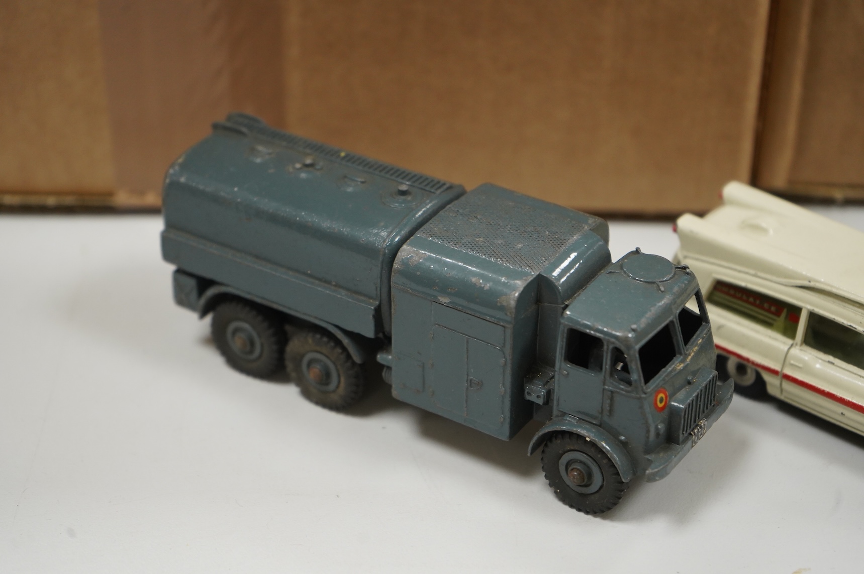 A collection of thirty-five Dinky Toys and five Spot On diecast vehicles, including; a Foden tanker, Leyland octopus, Maudsley horsebox, telephone service van, Royal mail van, and a selection of other cars and commercial